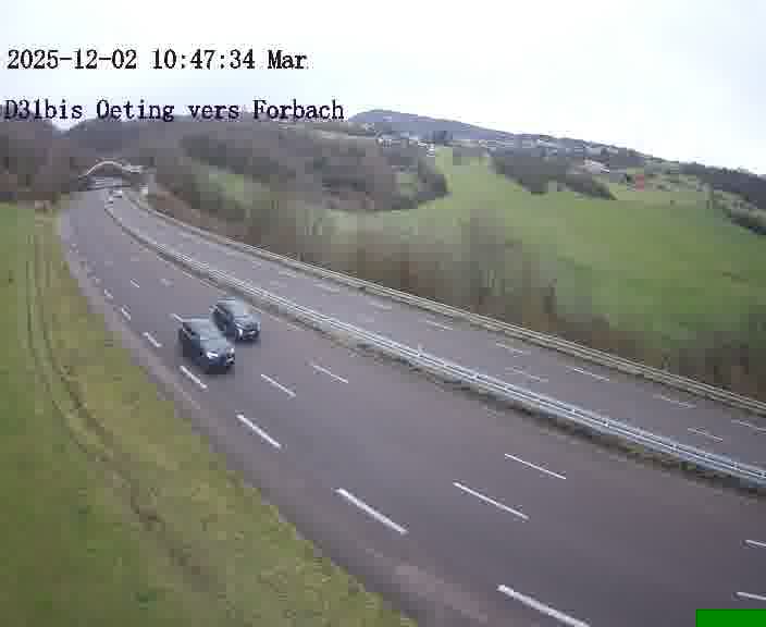 Caméra routière située sur D31bis (France) à Oeting, orientée vers Forbach, surveillant en continu la circulation locale et régionale.