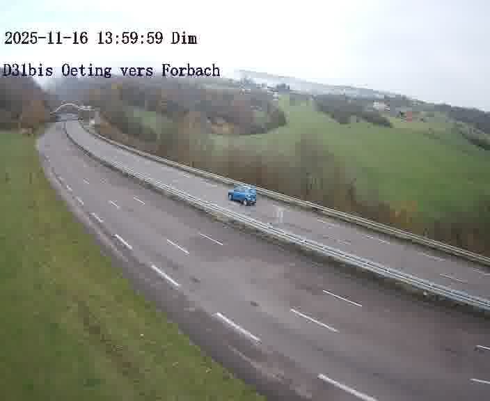 Caméra routière située sur D31bis (France) à Oeting, orientée vers Forbach, surveillant en continu la circulation locale et régionale.